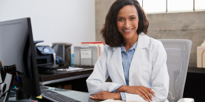 Female-doctor-on-computer_215835645 1
